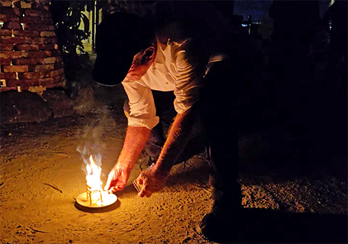 Steve Nagler of The Shrimps lighting chair on fire in performance art for John M. White memorial, 2025